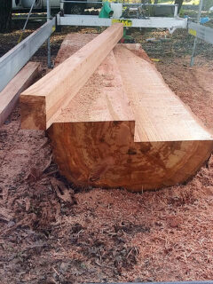 Redwood log with dimensional board cut on lucas mill